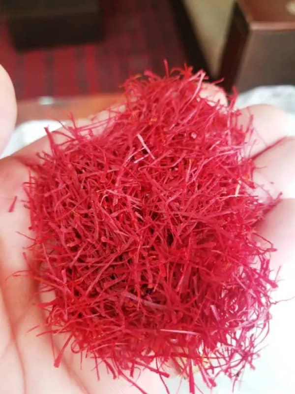 Saffron Threads In Hand
